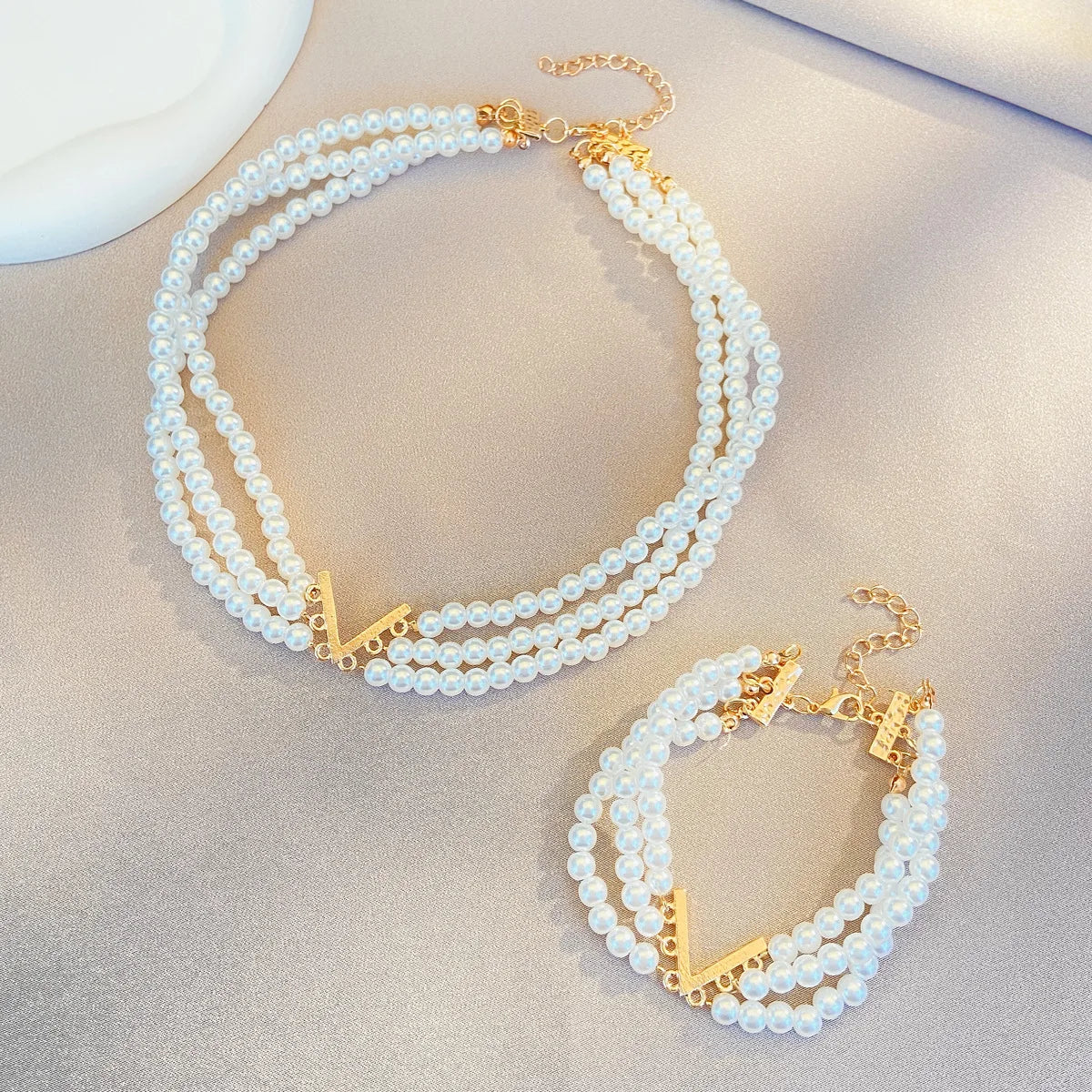 Venusiva New Multi-Layer Pearl Jewelry suit Women's Ins Style European and American Creative Design V-Collar Bracelet suit